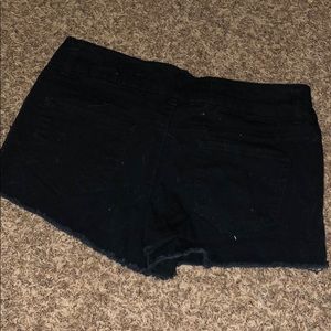 Black frayed shorts